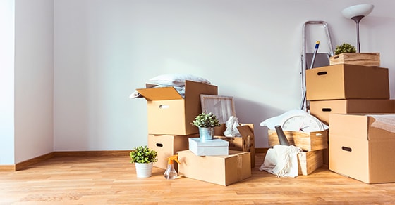 moving day boxes in an empty room