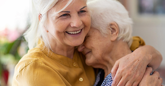 old people hugging