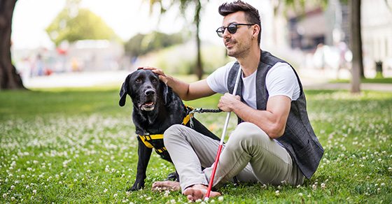 man with his support dog