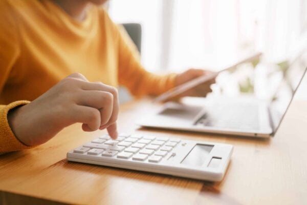 woman using calculator