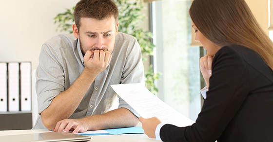 employee looking at client documents