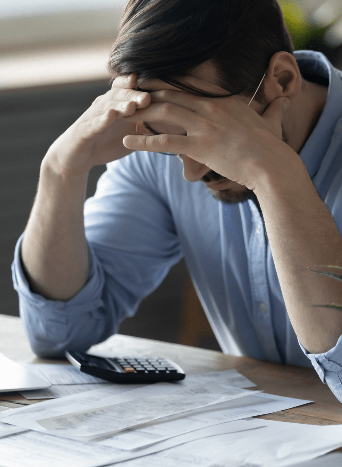 man working on tax preparation