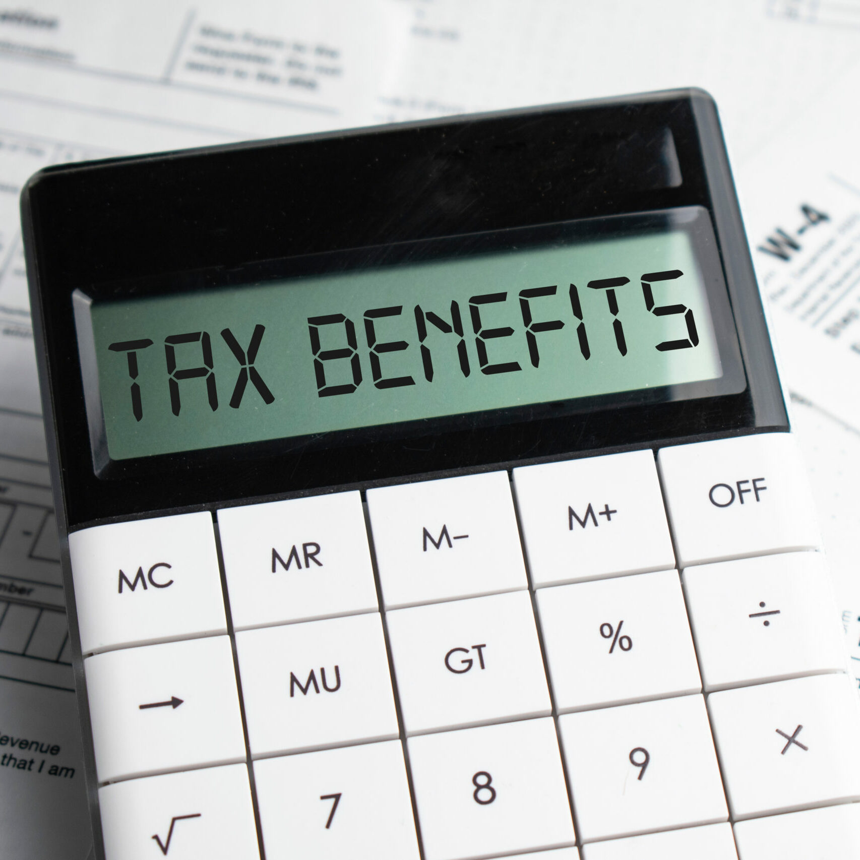 TAX benefits word on calculator. Business and tax concept. Time to pay tax in year.