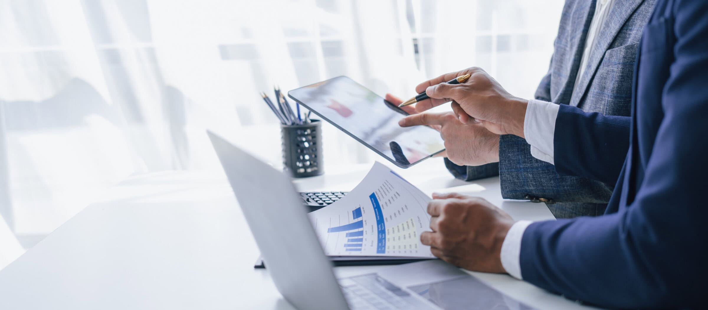 Using tablet pc, Consultant between bookkeepers and accounting lawyer consultation about asset, balance sheet, stock market statistics and yearly tax law, protect business from bribery.
