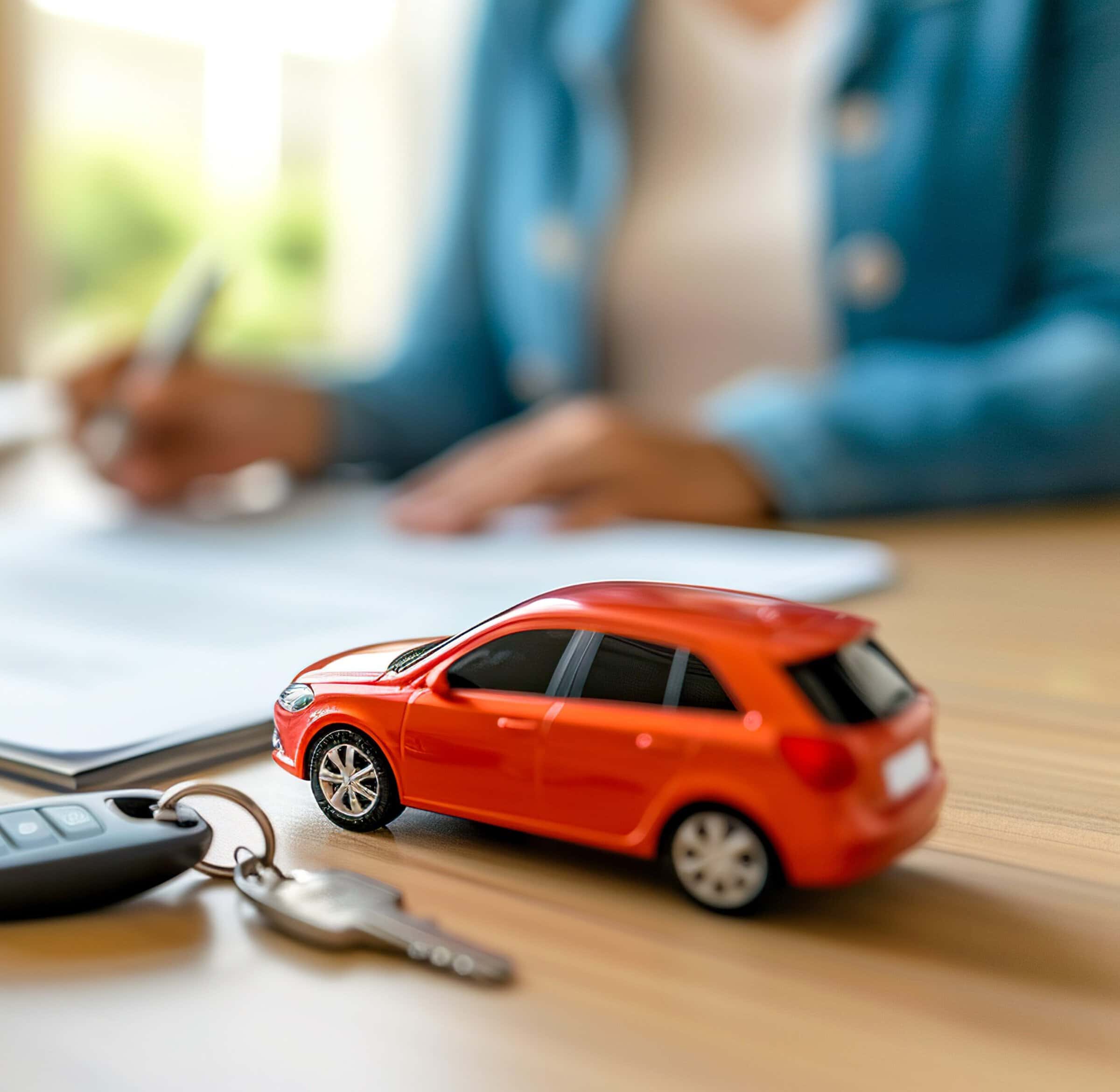 Woman buying or selling new or used car. Person signing car insurance document, lease or rental paper