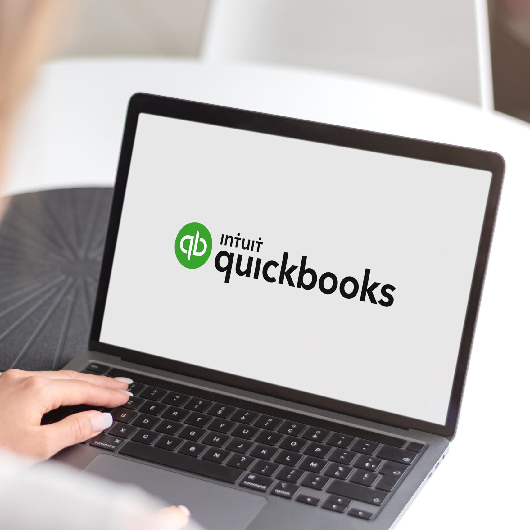 Guilherand-Granges, France - October 21, 2020. Notebook with Intuit Quickbooks logo. American accounting software service for small and medium-sized businesses.